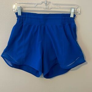 High rise dark blue size 6 4.5” inseam Lululemon shorts. Great condition!